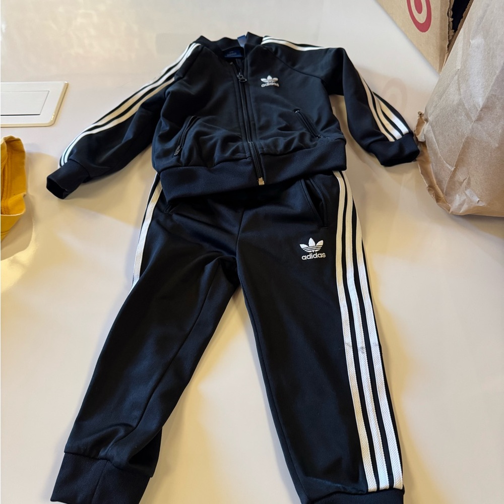 Adidas 2T track suit, like new. Classic styles